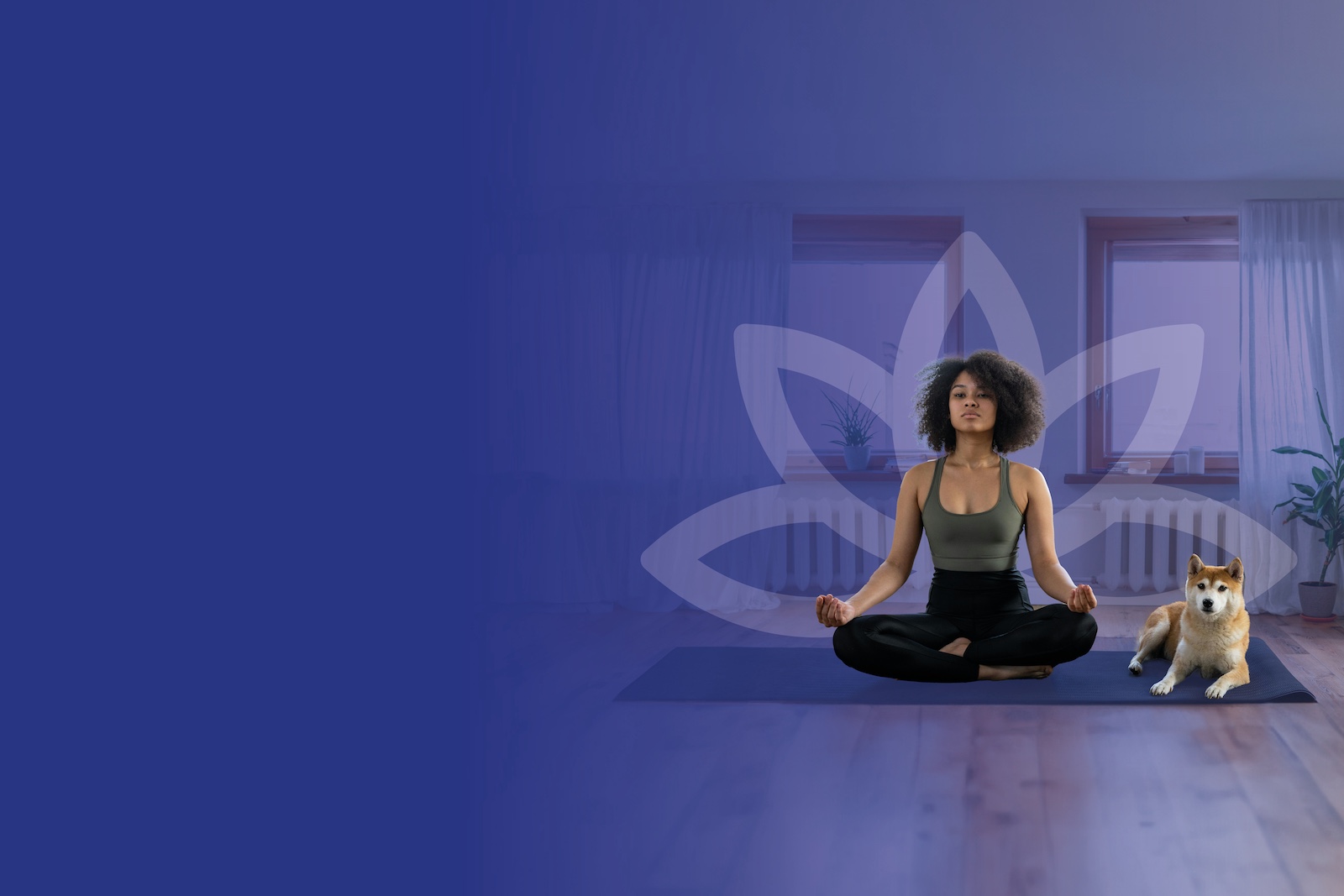 A young multiracial woman meditating on a yoga mat next to her dog.