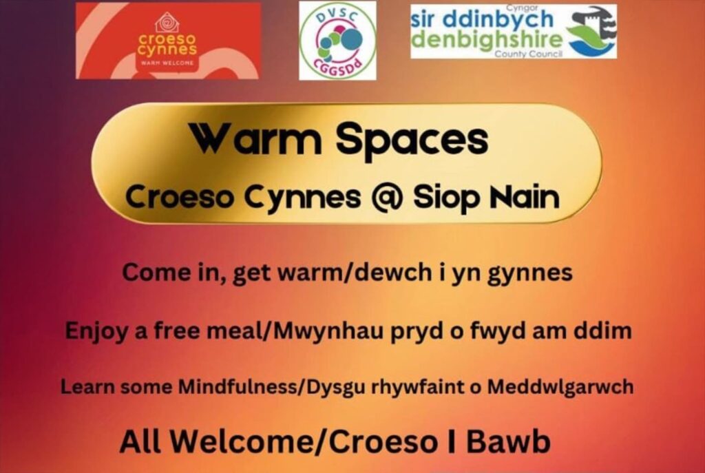 Warm Spaces event poster. The poster is an orange gradient with a gold banner.