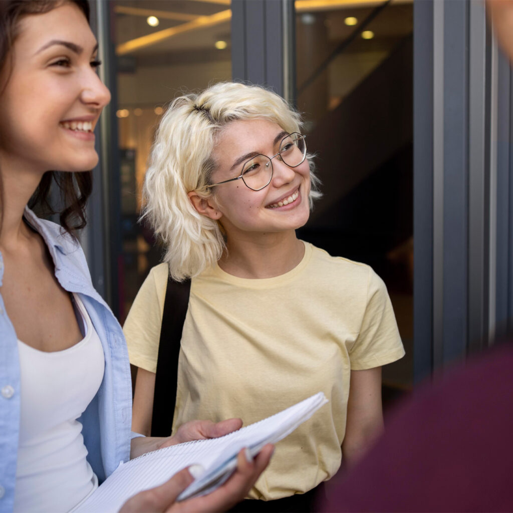 two happy young adult girls